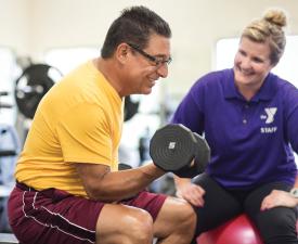 Staff member assisting a client